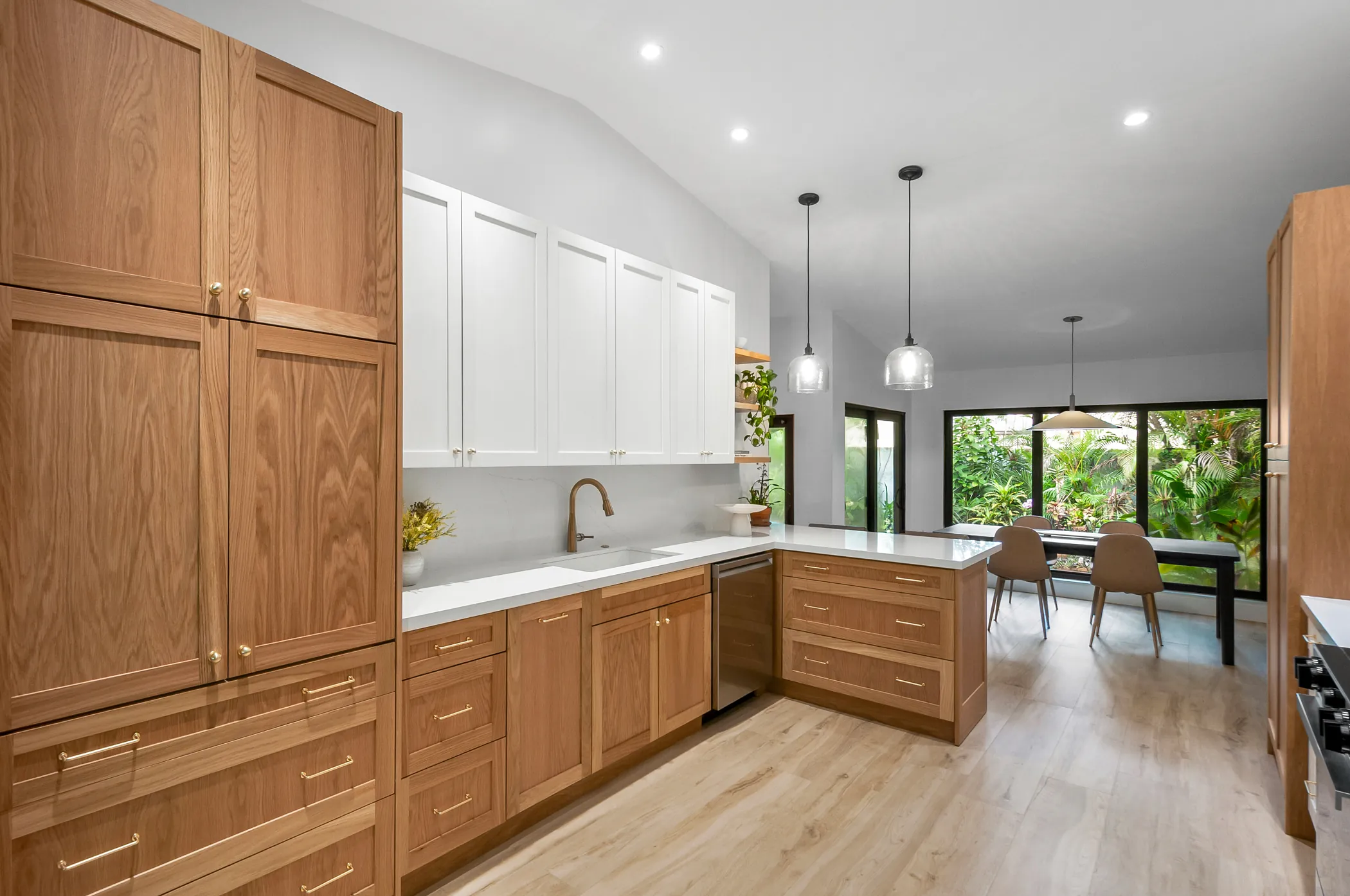 The kitchen, opened to the dining room