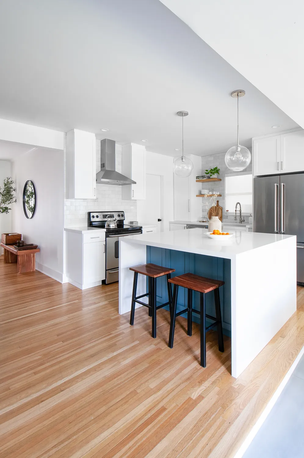 Renovated kitchen with blue island