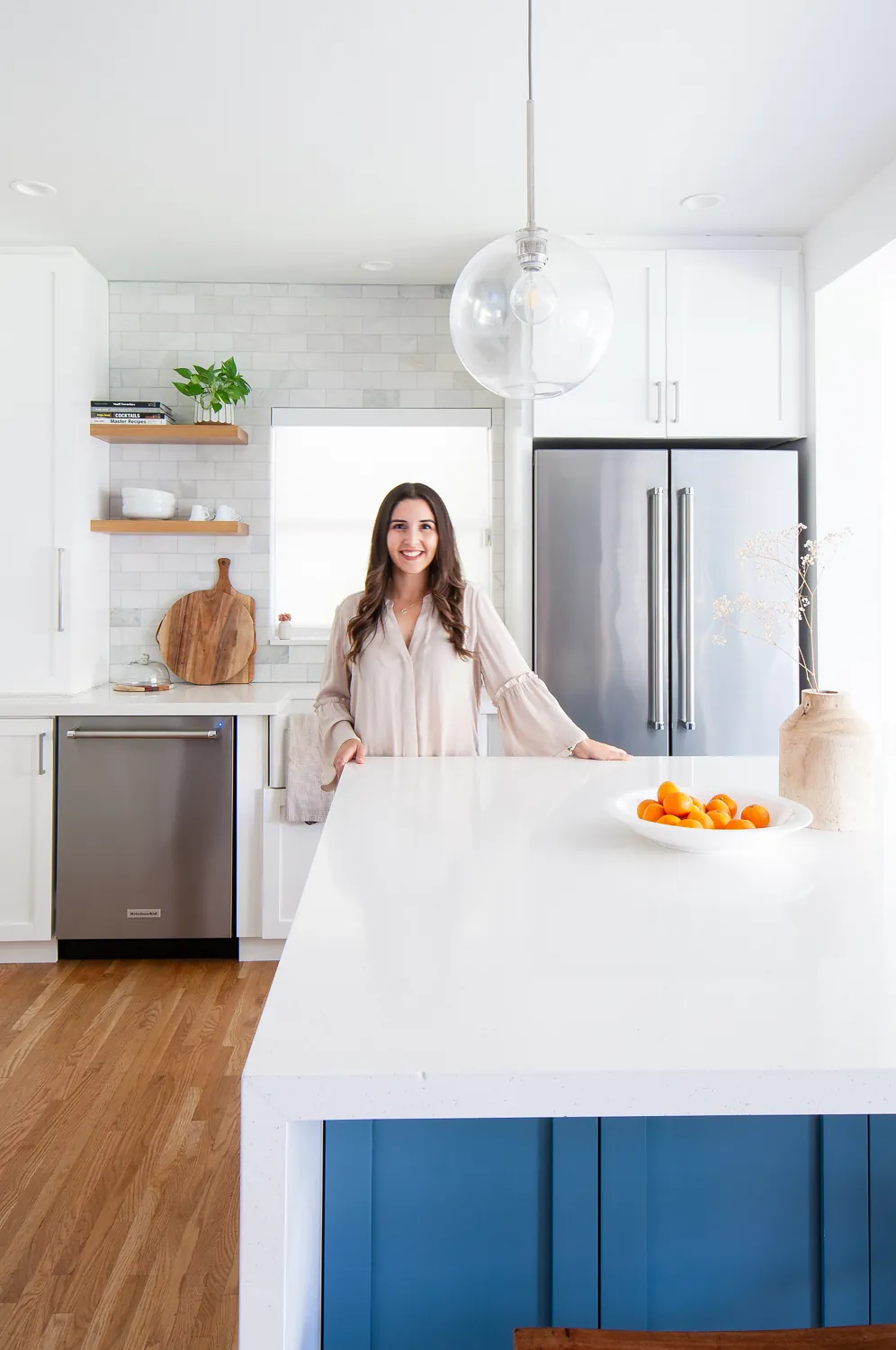 Camila in the finished kitchen