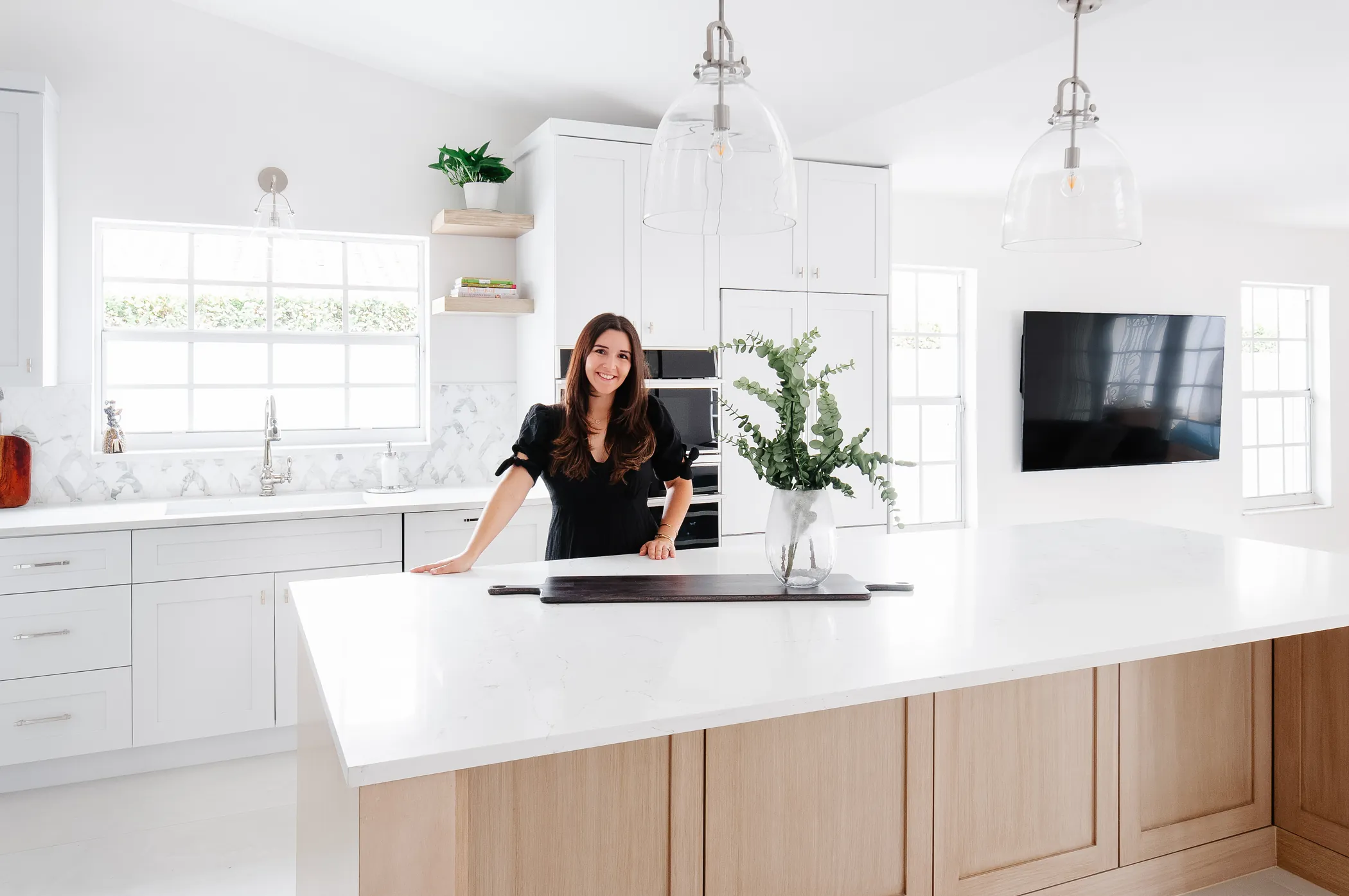 Camila in the finished kitchen