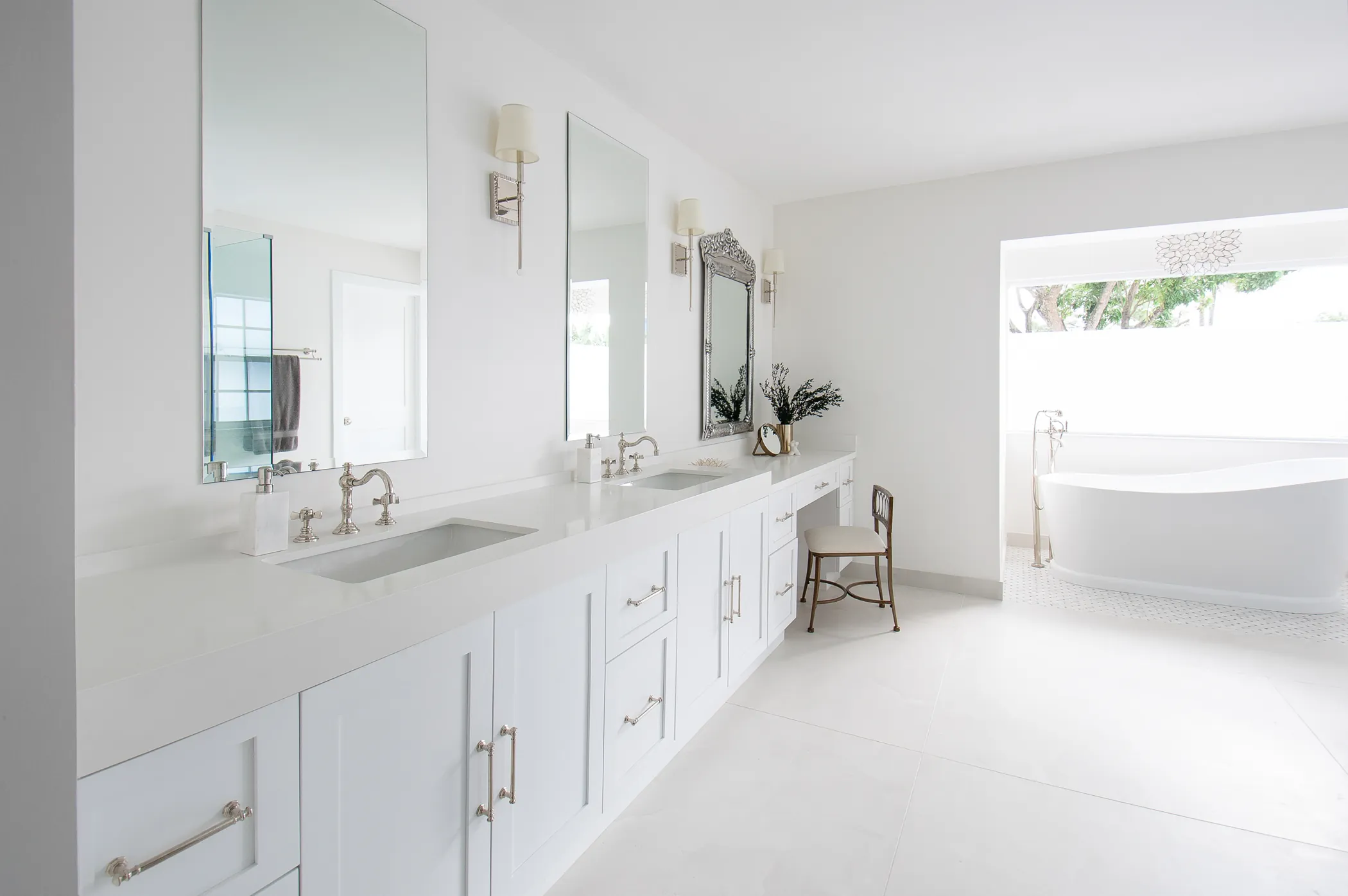 Master bath with long white double vanity