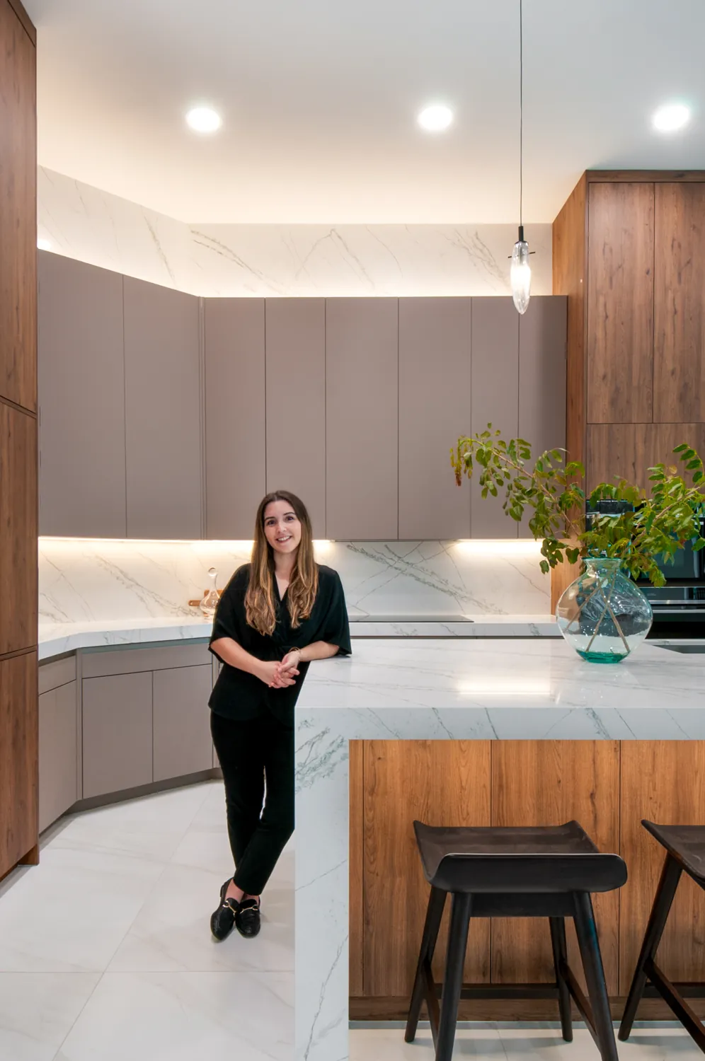 Camila in the finished kitchen