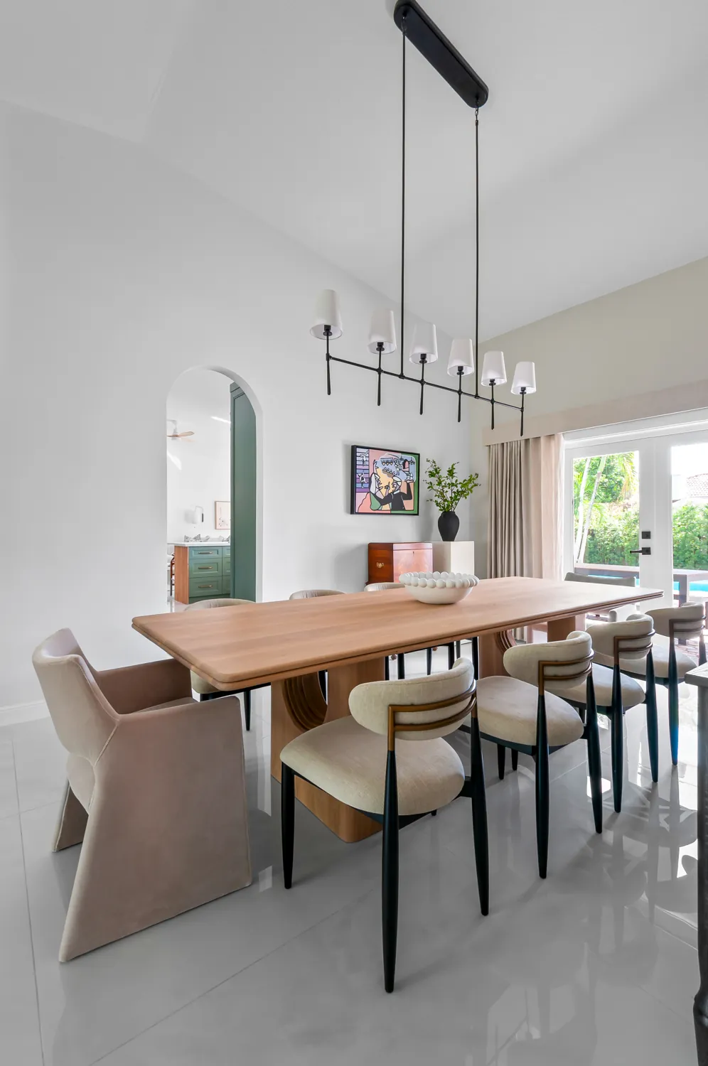 Custom dining table under the vaulted ceiling