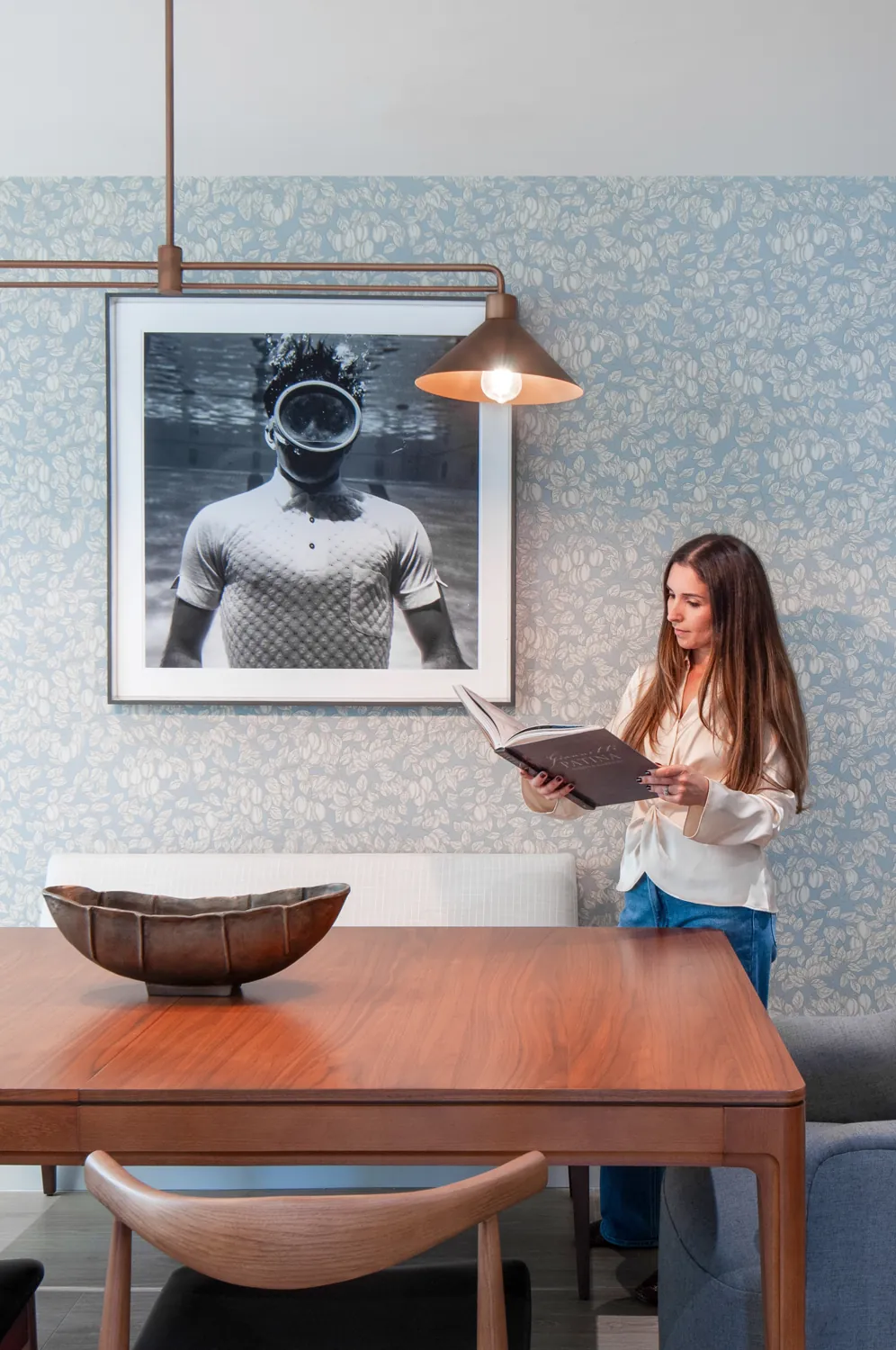 Camila in the dining room she designed