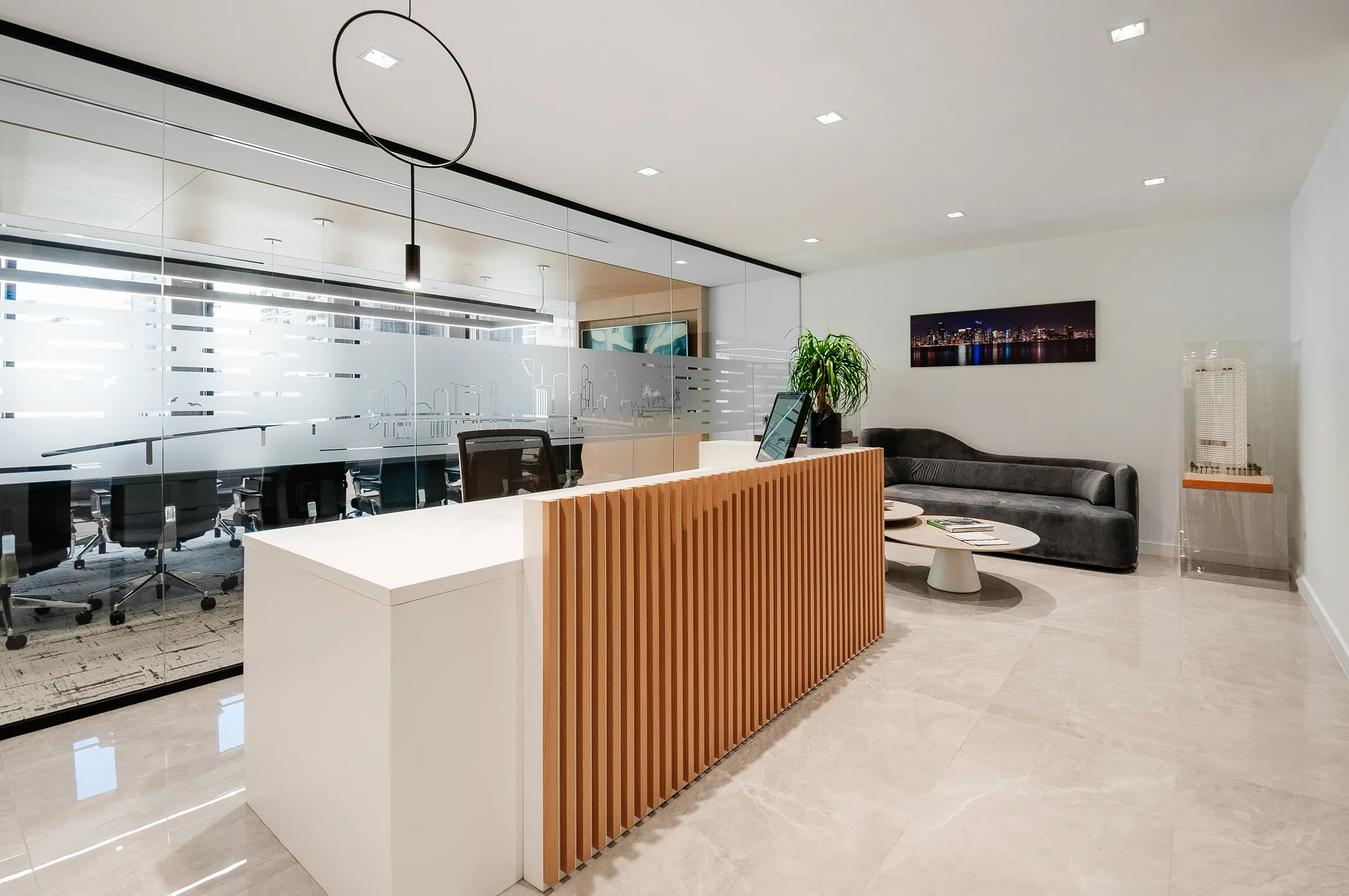 Reception and lounge with oak slat welcome desk