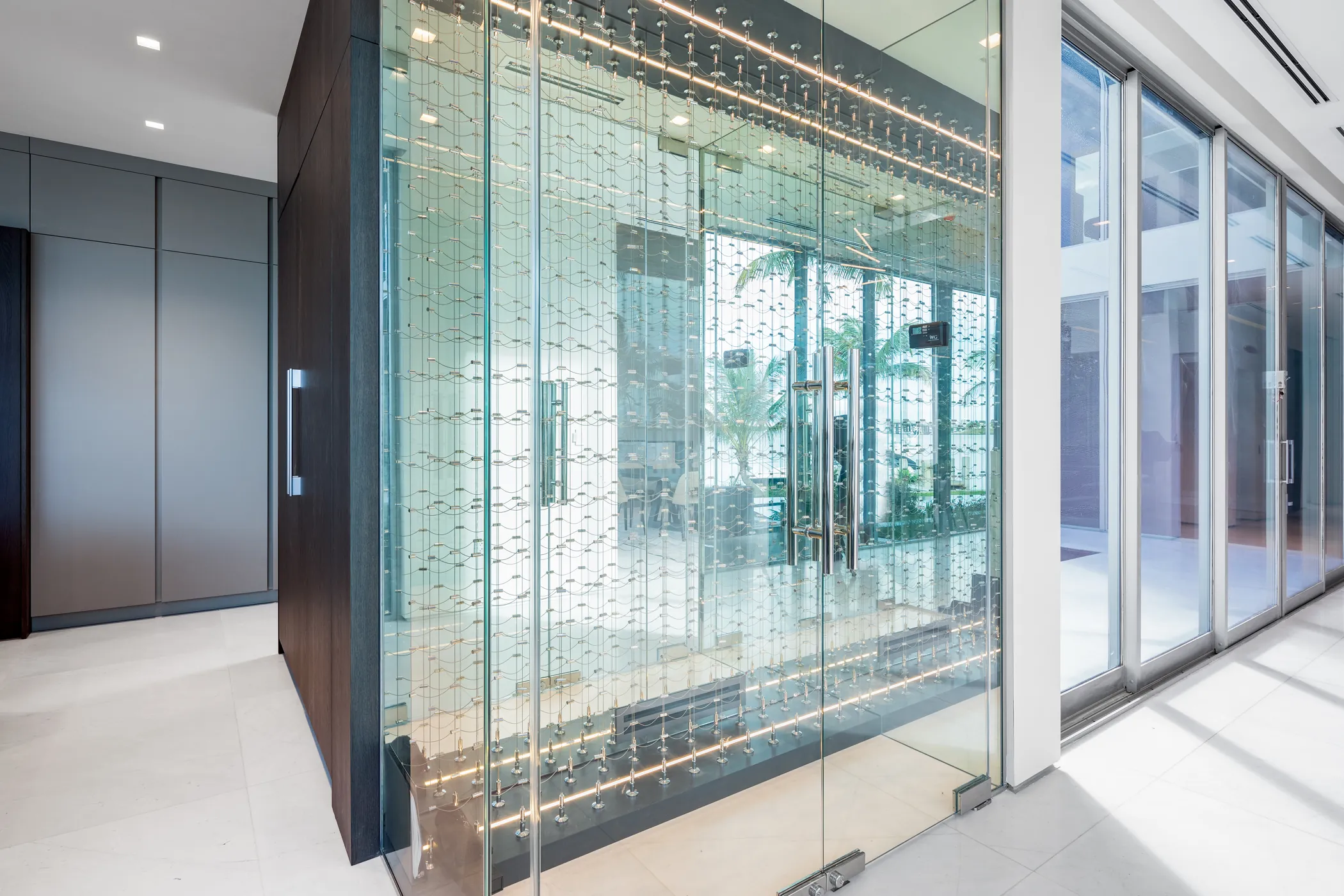 Glass-walled wine cellar